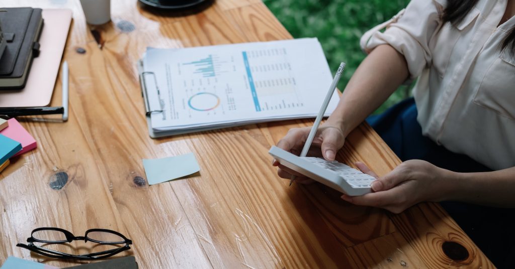 Tax deduction planning concept. Accounting woman calculating business balance prepare tax reduction